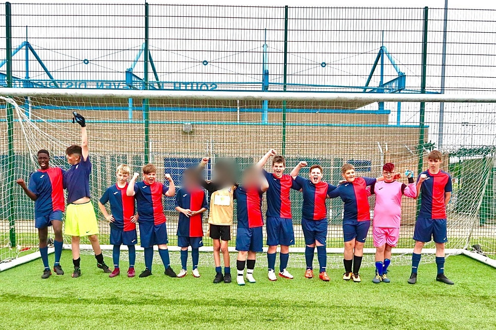 Foxfields pupils celebrate on the pitch as they win the tournament!