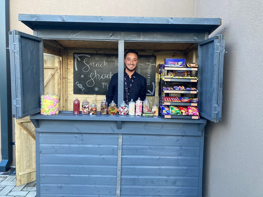 Mr Hamilton serving at the Snack Shack