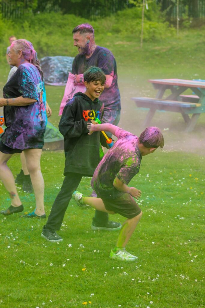 Pupils playing and running the colour run